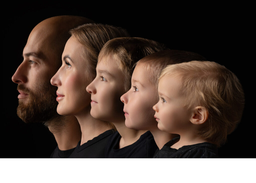 Family profile portrait on a black background